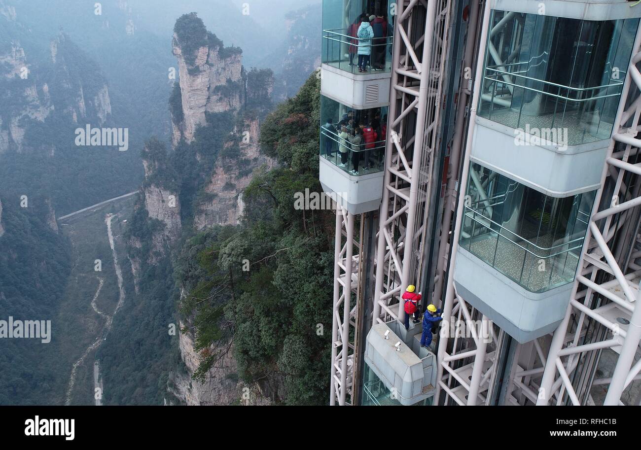 Beijing, China's Hunan Province. 24th Jan, 2019. Maintenance workers check  the operating status of the 326-meter Bailong Elevator, the world's highest  outdoor elevator, at the Wulingyuan Scenic Area in Zhangjiajie, central  China's