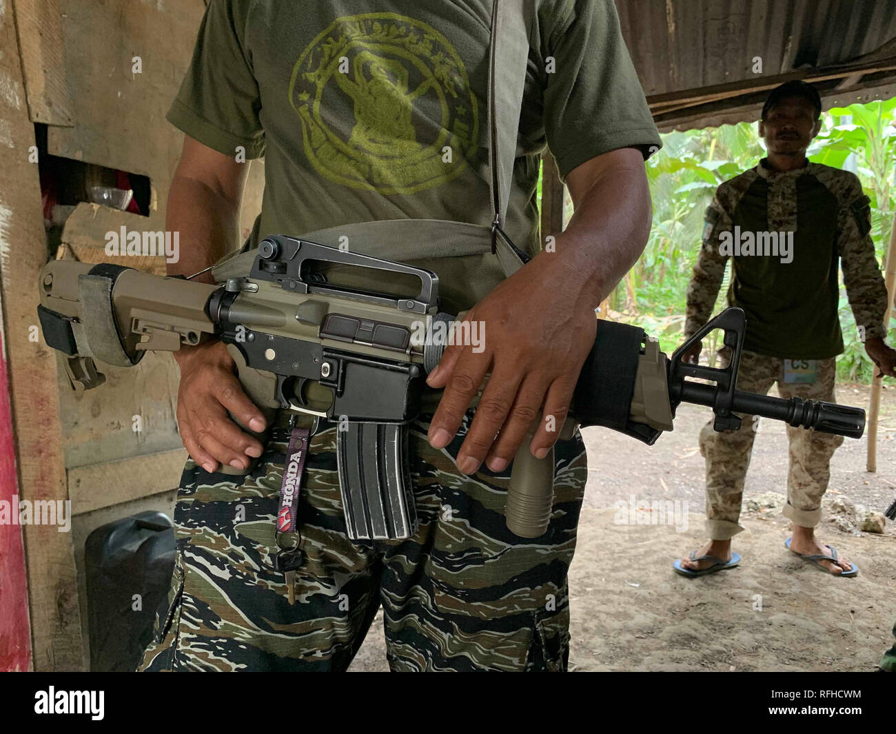 Maguindanao, Philippines. 26th January 2019. Filipino Muslim rebels are seen inside their detachment in Sultan Kudarat town in Maguindanao in the southern Philippines, Saturday, January 26, 2019 as the Comelec announced Bangsamoro Organic Law (BOL) was “deemed ratified,” as officials released figures showing that more than 1.5 million registered voters had cast “yes” ballots for the law’s ratification versus nearly 200,000 who had voted against it.  The law aims to give the impoverished south an expanded autonomous area. Credit: Jeoffrey Maitem/Alamy Live News Stock Photo