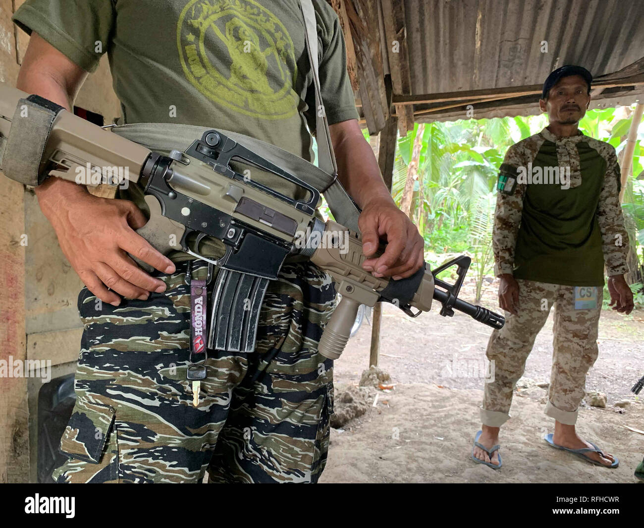 Maguindanao, Philippines. 26th January 2019. Filipino Muslim rebels are seen inside their detachment in Sultan Kudarat town in Maguindanao in the southern Philippines, Saturday, January 26, 2019 as the Comelec announced Bangsamoro Organic Law (BOL) was “deemed ratified,” as officials released figures showing that more than 1.5 million registered voters had cast “yes” ballots for the law’s ratification versus nearly 200,000 who had voted against it.  The law aims to give the impoverished south an expanded autonomous area. Credit: Jeoffrey Maitem/Alamy Live News Stock Photo