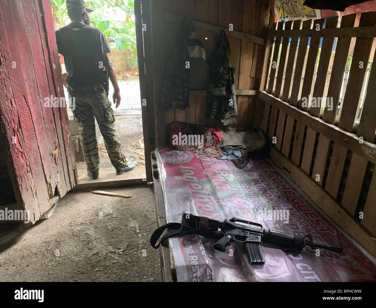 Maguindanao, Philippines. 26th January 2019. A Filipino Muslim rebel is seen inside their detachment in Sultan Kudarat town in Maguindanao in the southern Philippines, Saturday, January 26, 2019 as the Comelec announced Bangsamoro Organic Law (BOL) was “deemed ratified,” as officials released figures showing that more than 1.5 million registered voters had cast “yes” ballots for the law’s ratification versus nearly 200,000 who had voted against it.  The law aims to give the impoverished south an expanded autonomous area Credit: Jeoffrey Maitem/Alamy Live News Stock Photo