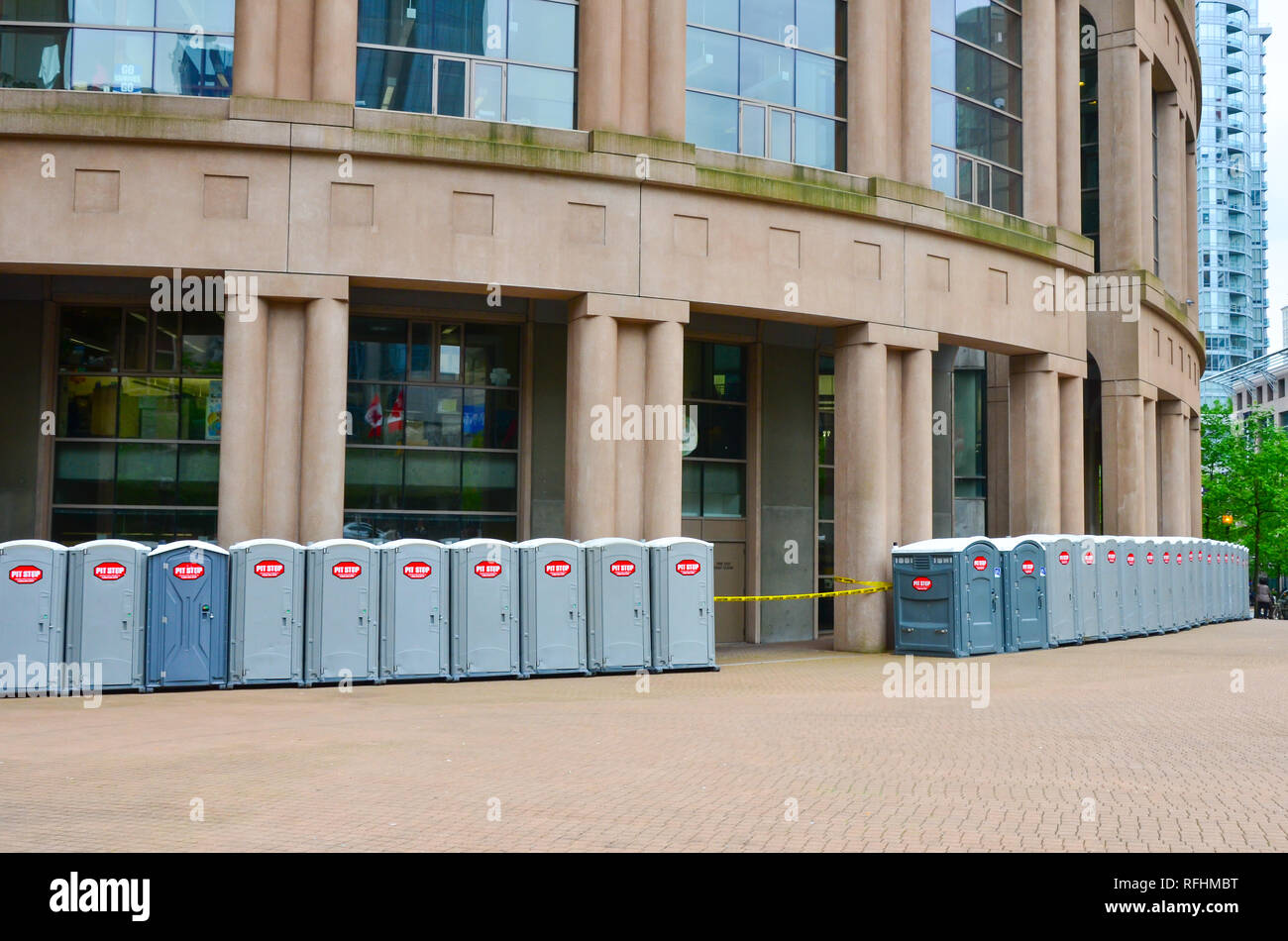 potties surround the Vancouver Public Library in preparation for an event in Vancouver, British Columbia, Canada. Stock Photo