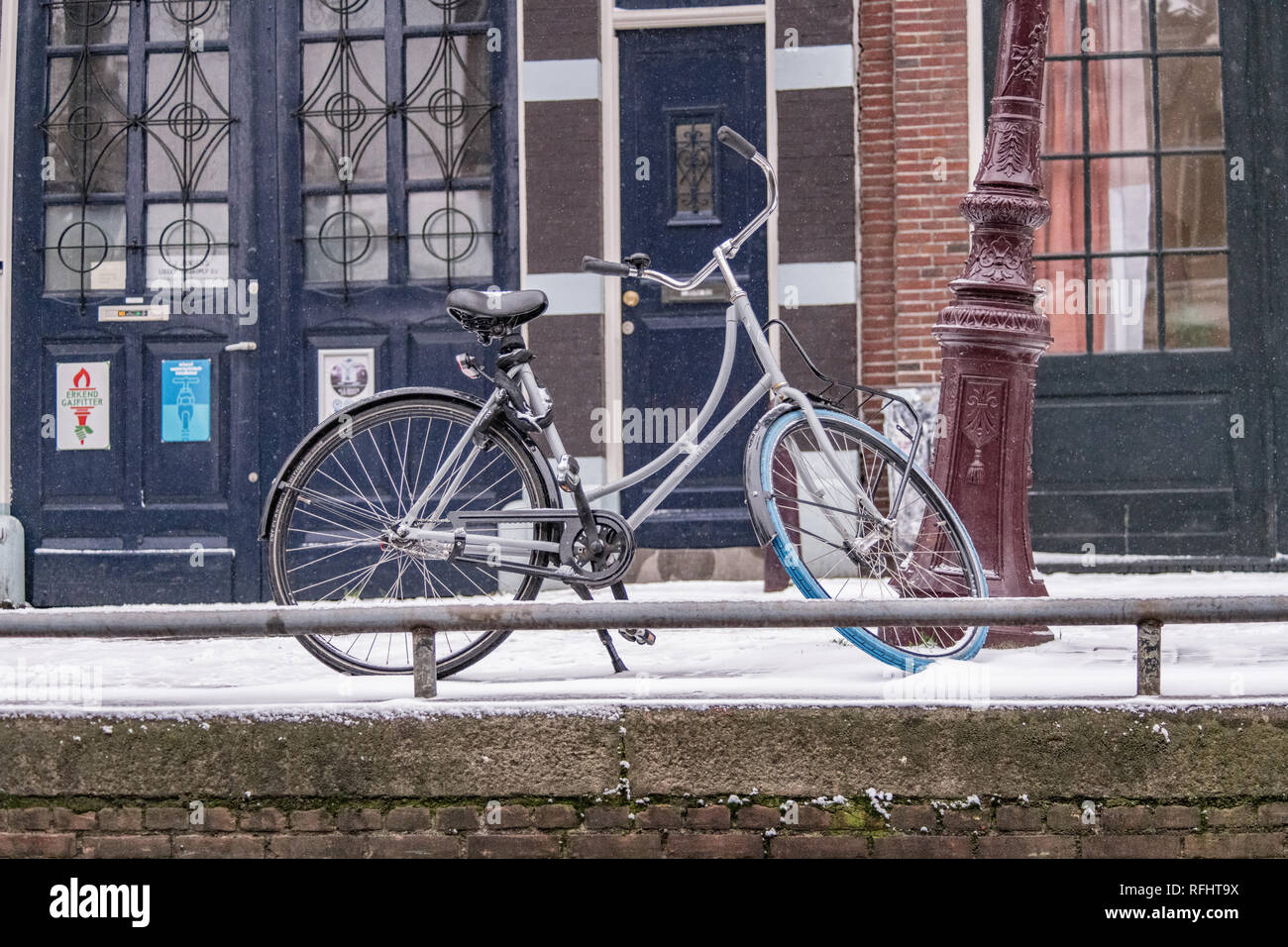 Bikes in snow Stock Photo
