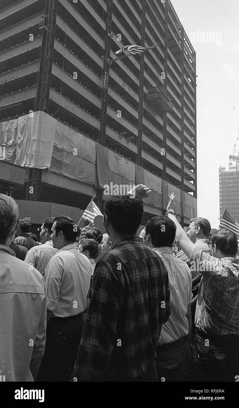 Demonstrators are viewed from behind while participating in protests related to the anti-Vietnam War Hard Hat Riot, New York City, New York, May 1970. () Stock Photo