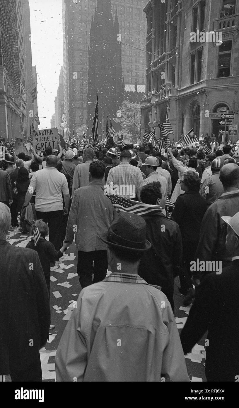 Demonstrators march and hold banners and flags while participating in protests related to the anti-Vietnam War Hard Hat Riot, New York City, New York, May 1970. () Stock Photo
