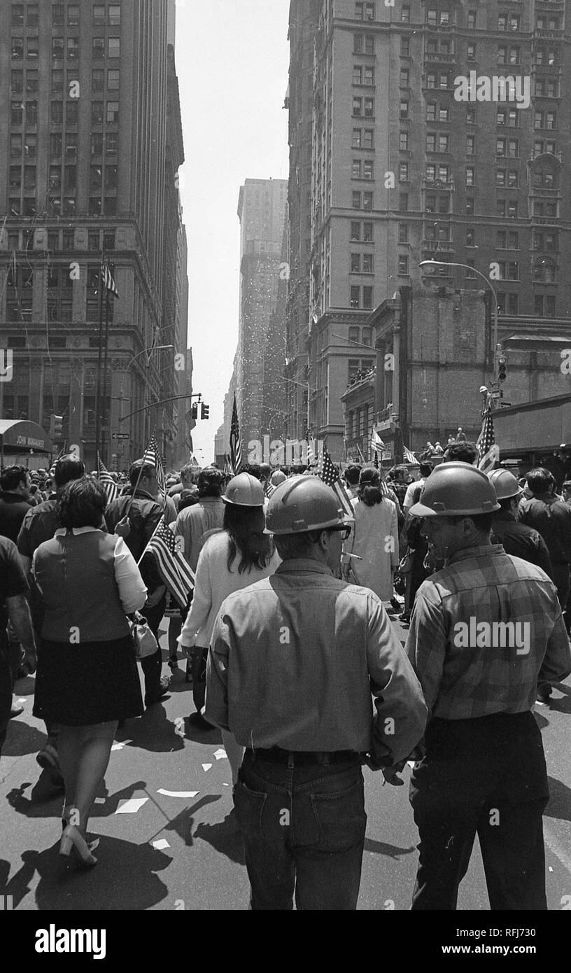 Demonstrators march while participating in protests related to the anti