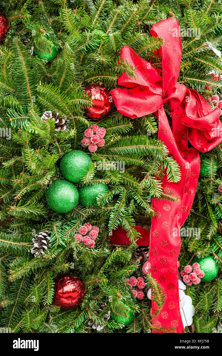 Fresh evergreen wreath on display at a roadside market in Randolph, Cattaraugus Co., NY Stock Photo