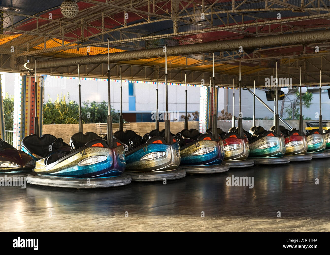 Amusement park bumper cars in a line Stock Photo Alamy