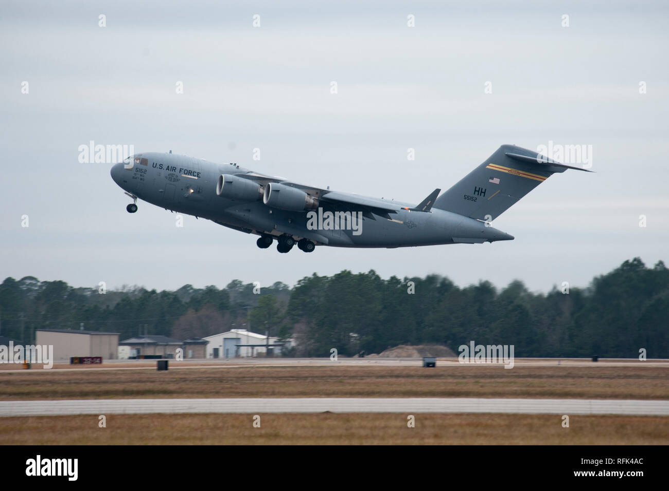 A Hawaii Air National Guard C-17 Globemaster III from the 154th Airlift Squadron takes off Jan. 17, 2019, during exercise Southern Strike at the Gulfport Combat Readiness Training Center, Miss. Southern Strike 19 is a total force, multi-service training exercise hosted by the Mississippi Air National Guard’s Combat Readiness Training Center in Gulfport and Camp Shelby Joint Forces Training Center near Hattiesburg, Miss. from Jan. 15 through Jan. 30. The exercise emphasizes air-to-air, air-to-ground and special operations forces training opportunities. (U.S. Air National Guard photo by Senior A Stock Photo