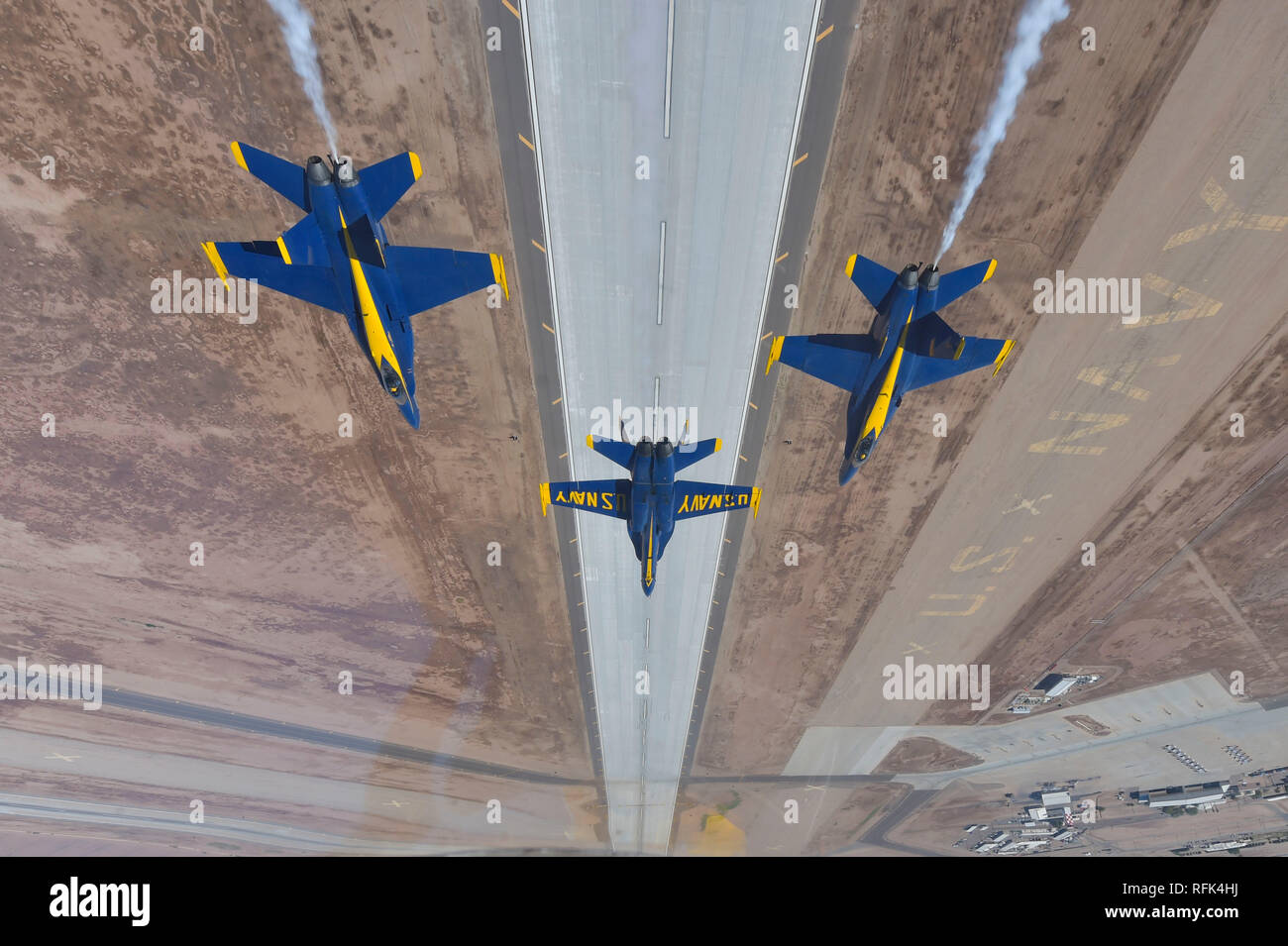 190124-N-OY339-1401 EL CENTRO, Calif. (Jan. 24, 2019) — Pilots assigned to the U.S. Navy Flight Demonstration Squadron, the Blue Angels, perform the double farvel maneuver during a winter training flight over Naval Air Facility (NAF) El Centro.  The team is scheduled to conduct 61 flight demonstrations at 32 locations across the country to showcase the pride and professionalism of the U.S. Navy and Marine Corps to the American public in 2019. (U.S. Navy photo by Mass Communication Specialist 2nd Class Christopher Gordon) Stock Photo