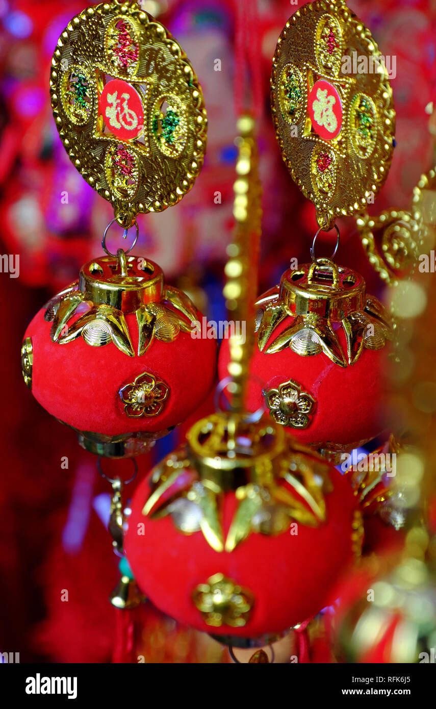 Close up of vibrant red ornaments for Tet at decoration shop on ...