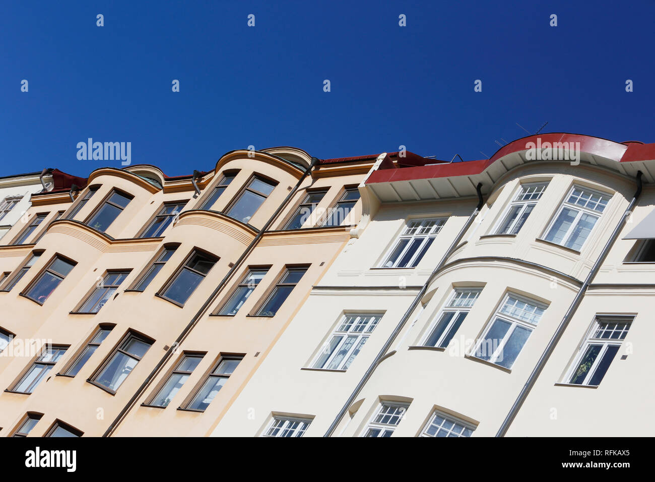 Older multi-stories residential building exteriors. Stock Photo