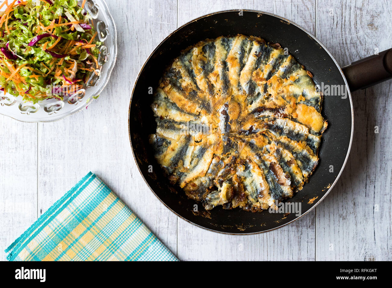 Fresh Fried Sardines / Anchovy Hamsi Tava in Pan on Wooden Surface