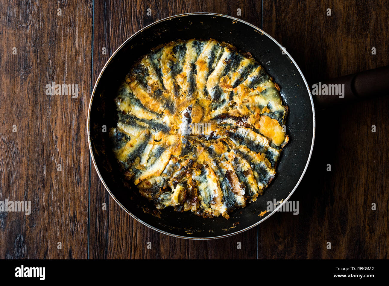 Fresh Fried Sardines / Anchovy Hamsi Tava in Pan on Wooden Surface
