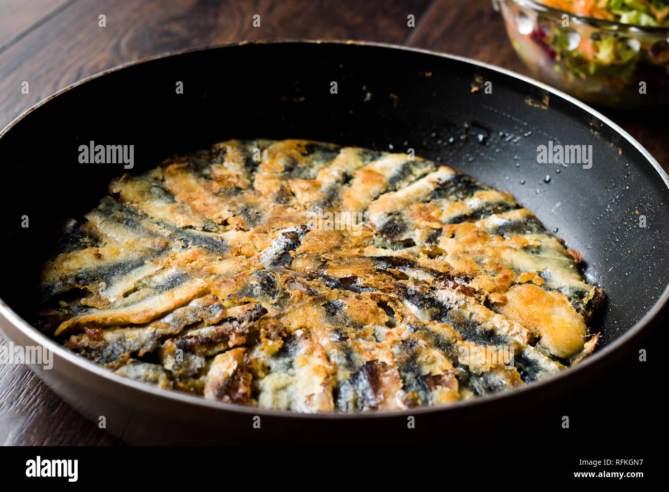 Fresh Fried Sardines / Anchovy Hamsi Tava in Pan on Wooden Surface