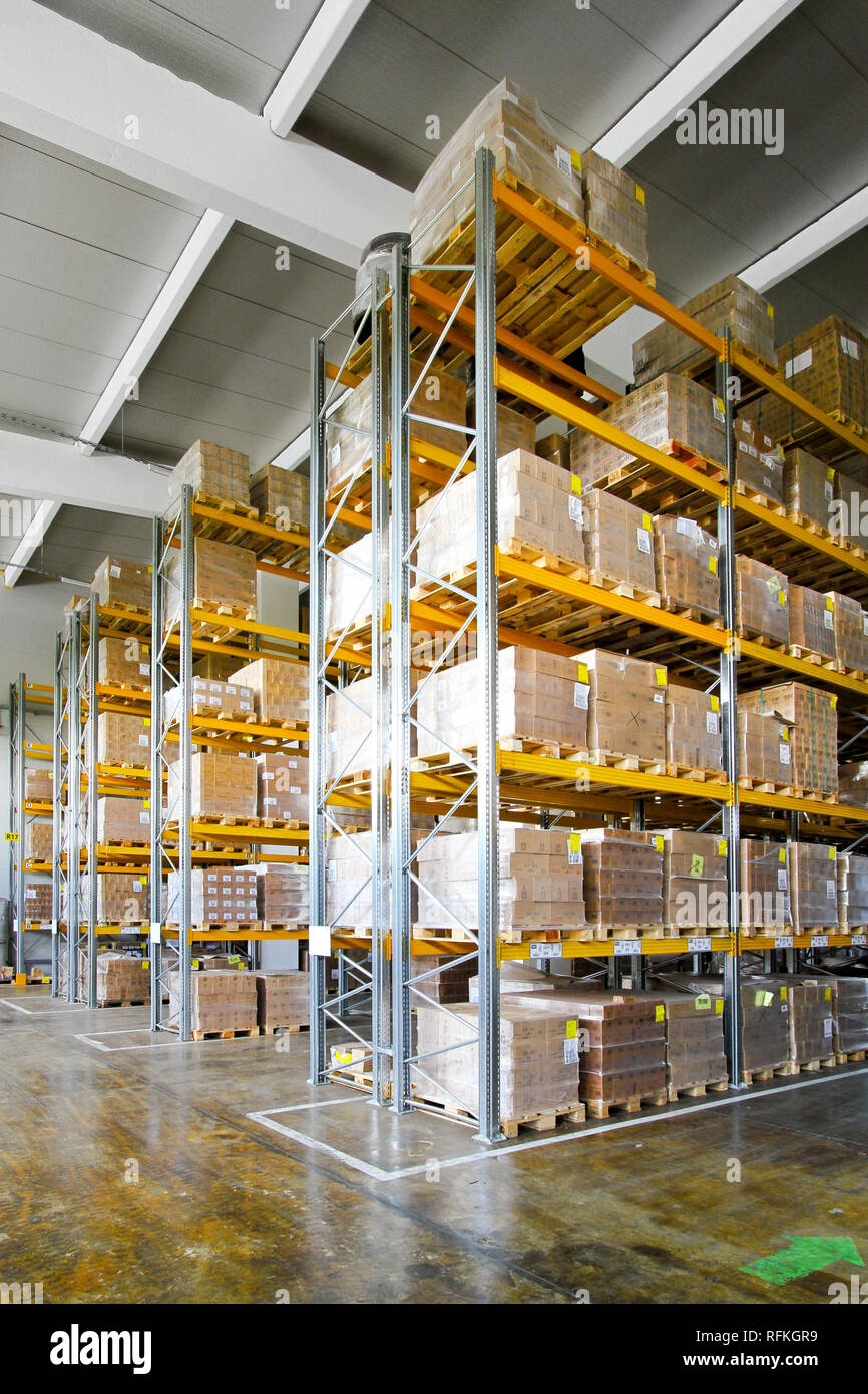 Distributionon Shelf Tall shelves and racks in distribution storehouse Stock Photo - Alamy