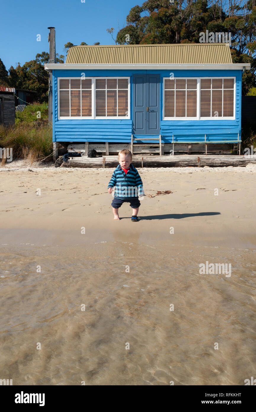 Toddler playing at the beach, Tasmania, Australia Stock Photo Alamy