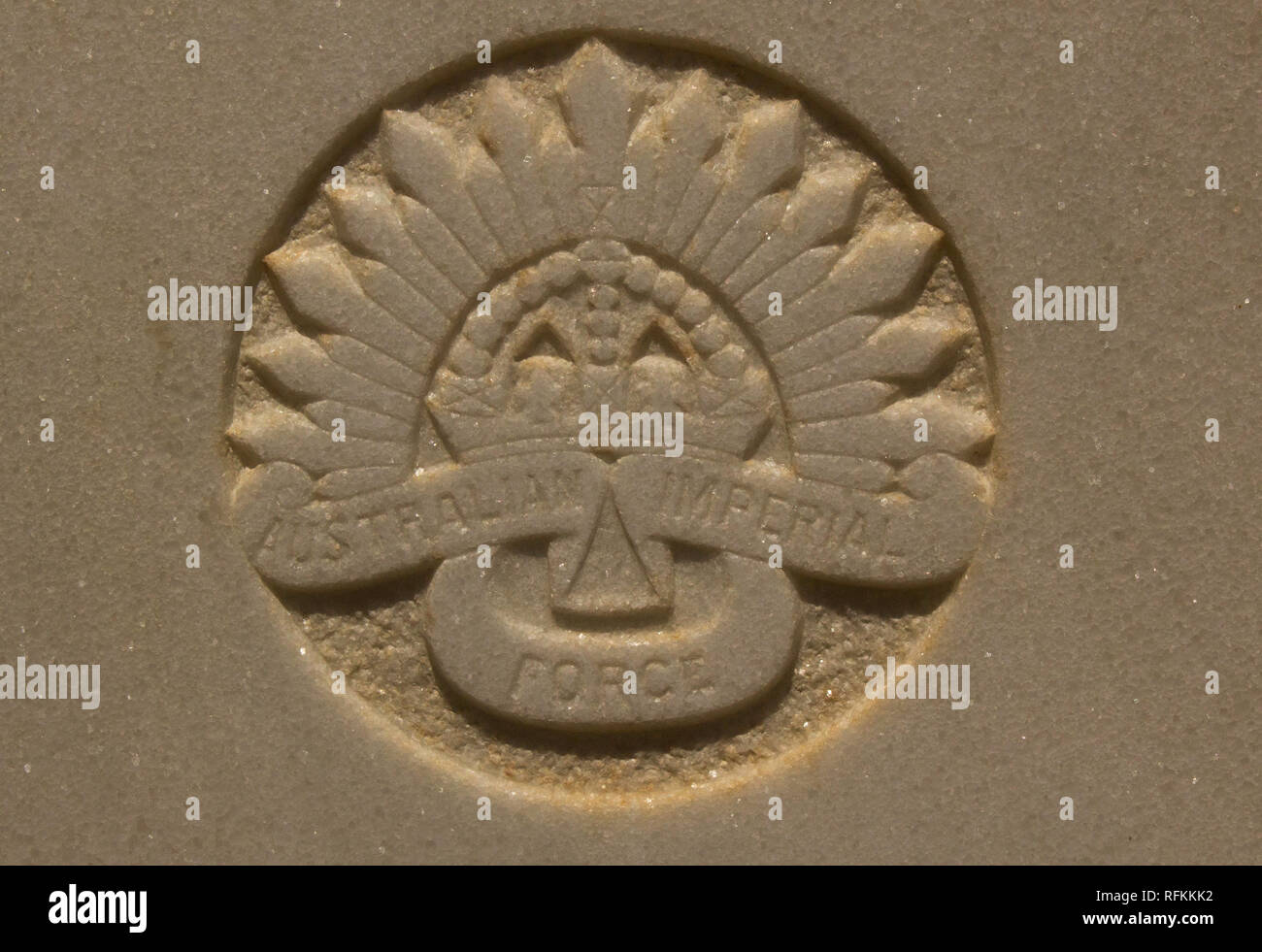An Australian Imperial Force circular emblem on a marble tombstone Stock Photo