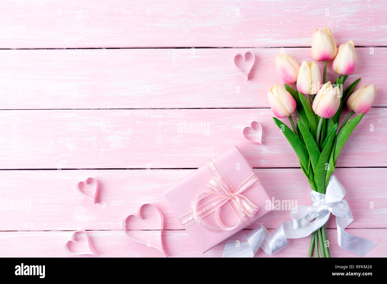 Valentines day and love concept. Pink paper hearts with gift box and ...