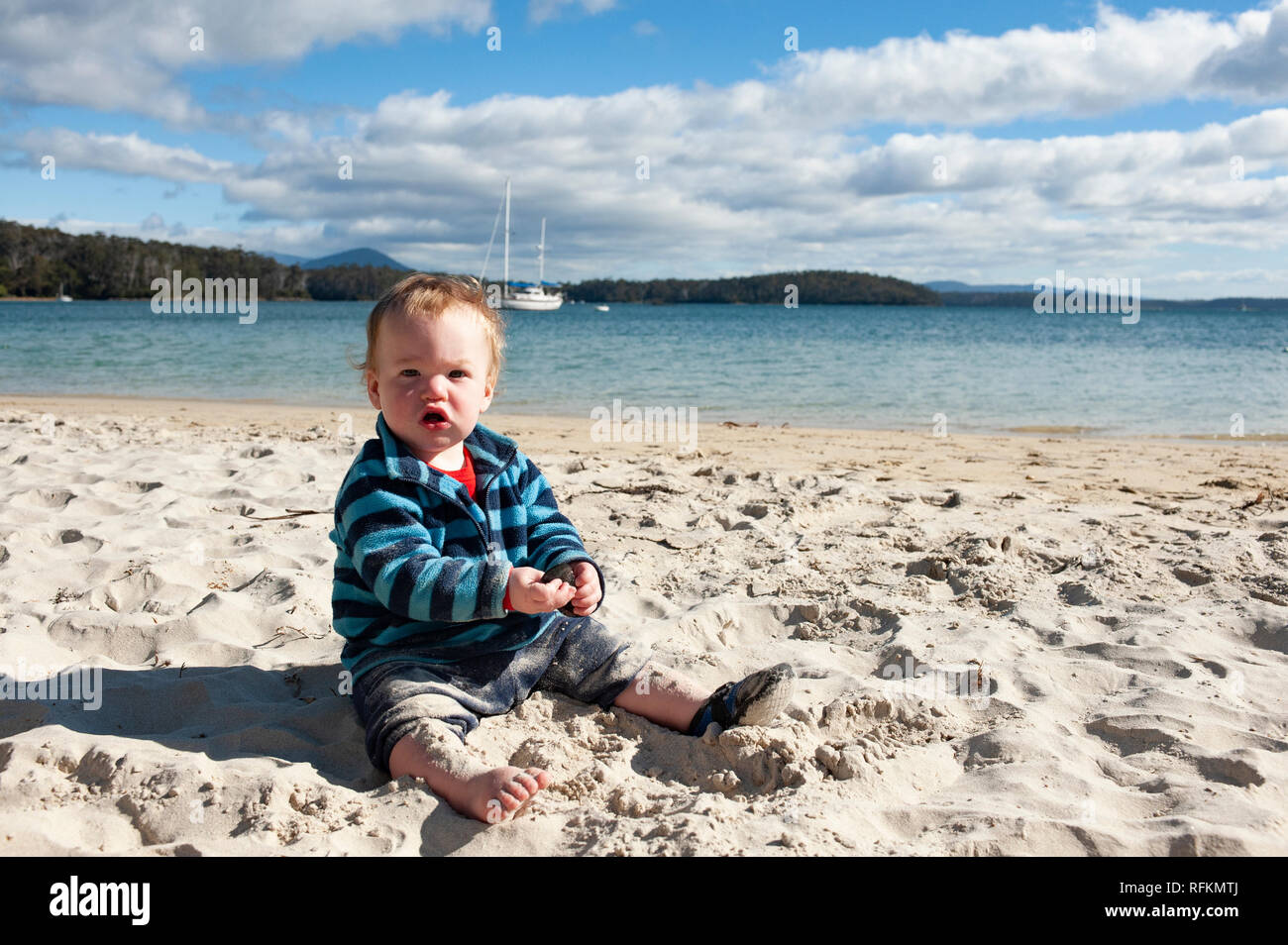 Toddler playing at the beach, Tasmania, Australia Stock Photo Alamy