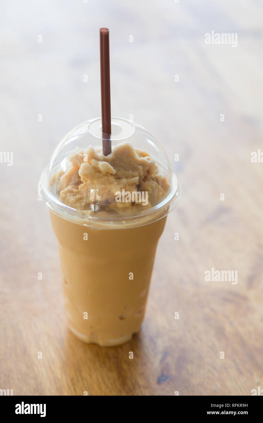 Milk coffee smoothie in plastic cup Stock Photo