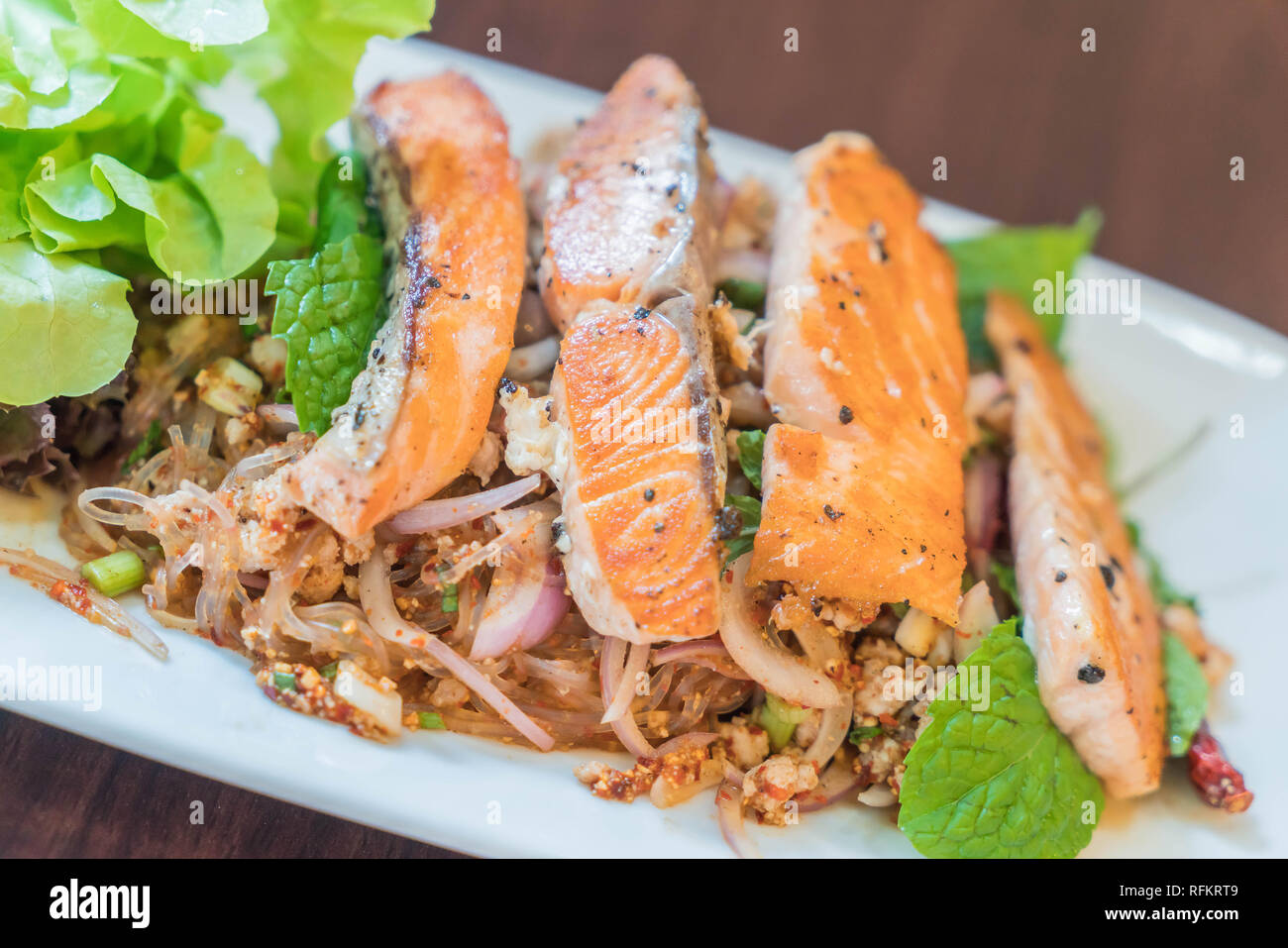 Spicy salmon sald. Thai style salad. Stock Photo