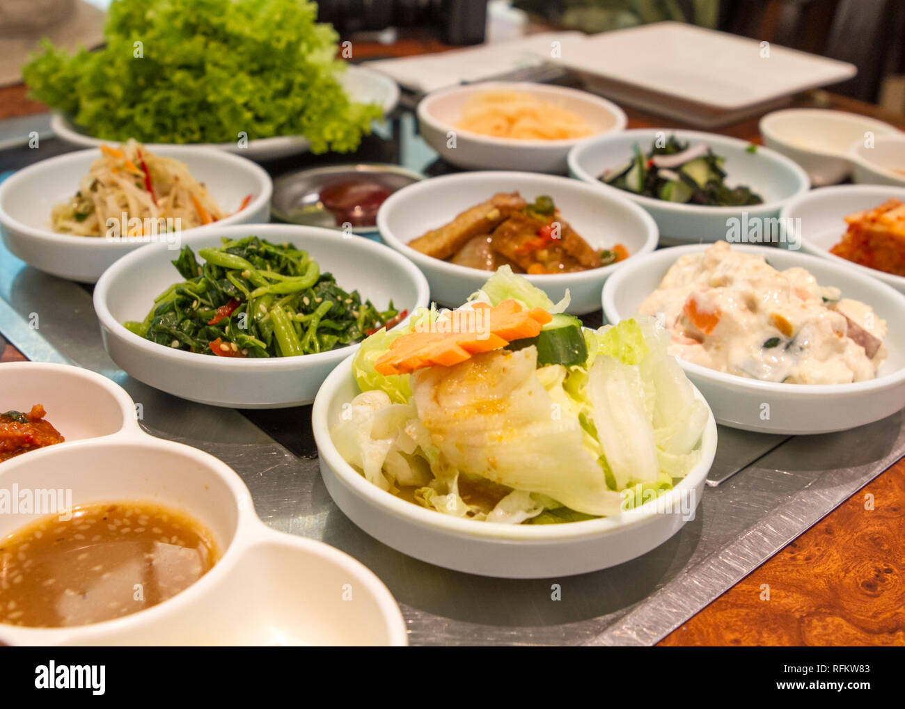 Korean food in a restaurant Stock Photo - Alamy