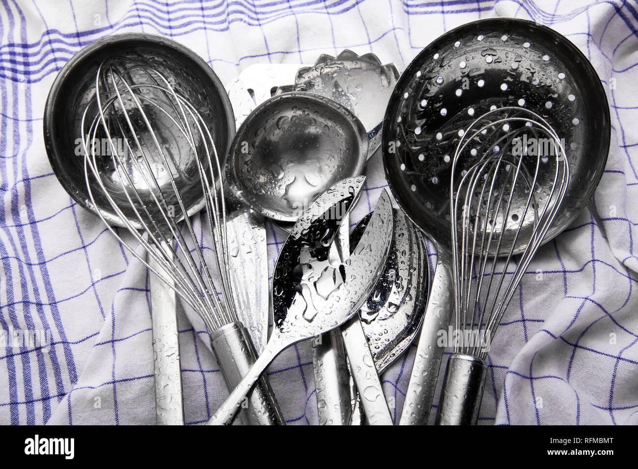 kitchen utensils on a kitchen towel Stock Photo Alamy