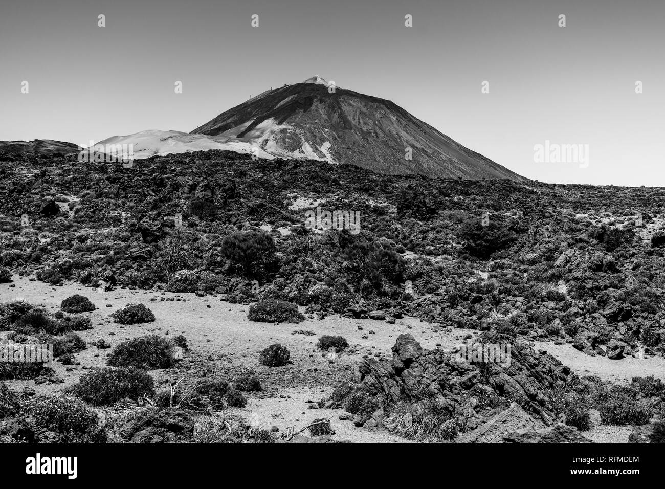 The lava fields of Las Canadas caldera of Teide volcano. Viewpoint: Minas de San Jose. In the background is the peak of the Teide volcano. Tenerife. C Stock Photo
