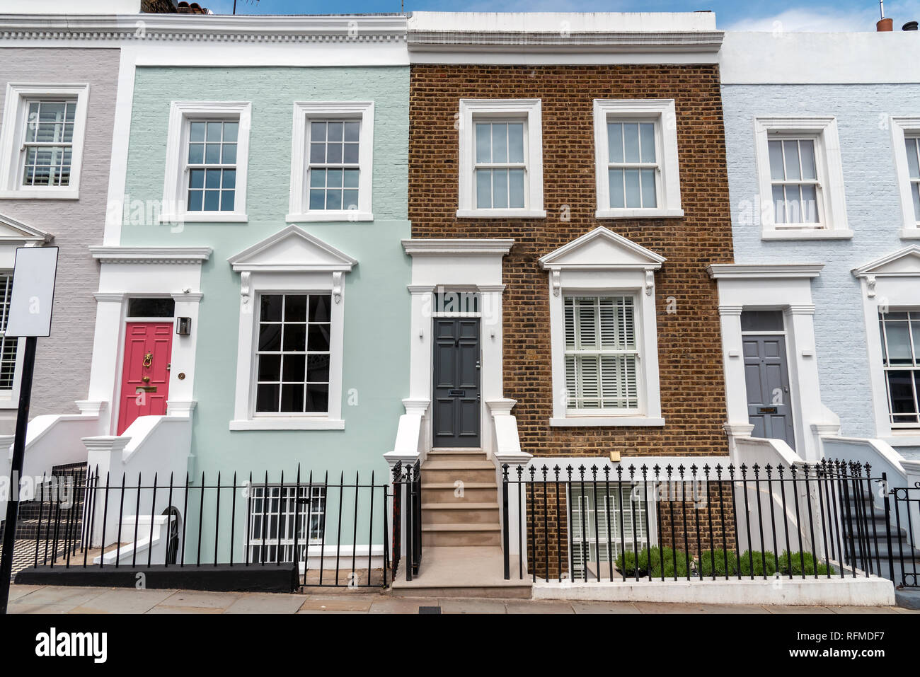 Colored row houses seen in Notting Hill, London Stock Photo