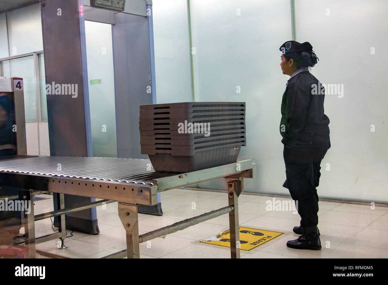 BANGKOK, THAILAND, NOV 27 2018, Control passengers and his baggage at the airport. Security officers at the airport Stock Photo