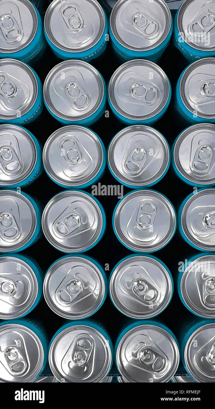 Closeup from above of many Beverage Cans in a Row. Beverage Cans made