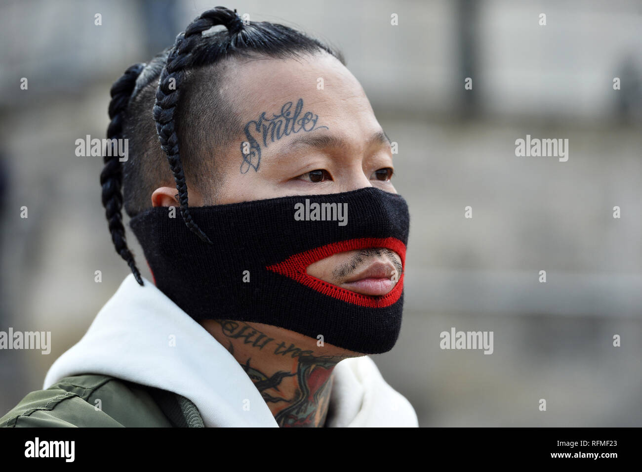 Face Tattooed guest with Gucci whool mask - StreetStyle at Louis