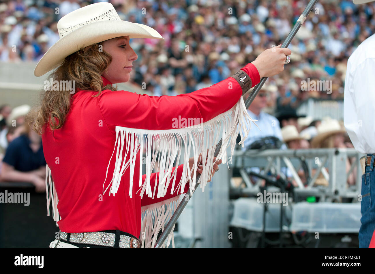 Flag Bearer with cowboy hat at Calgary Stampede, Calgary, Alberta