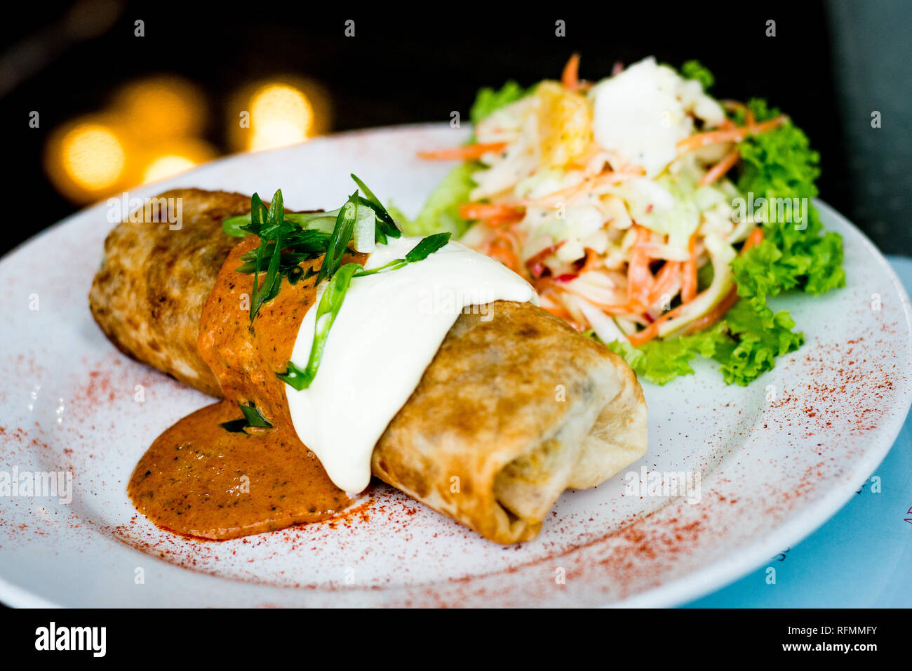 Oven Baked Chicken Chimichanga, With red beans, rice, cheese and tomato