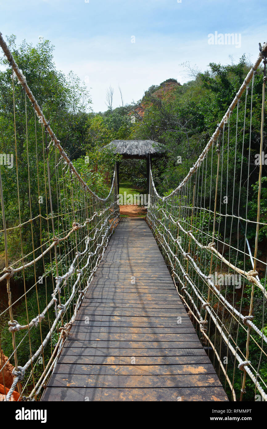 A rope bridge in the Bong Lai or Suoi Tre Red Canyons near Mui Ne in south central Bình Thuan Province, Vietnam Stock Photo