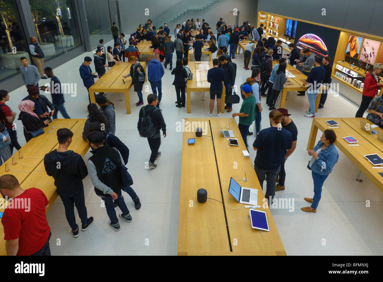 People visiting Apple store at downtown Stock Photo Alamy