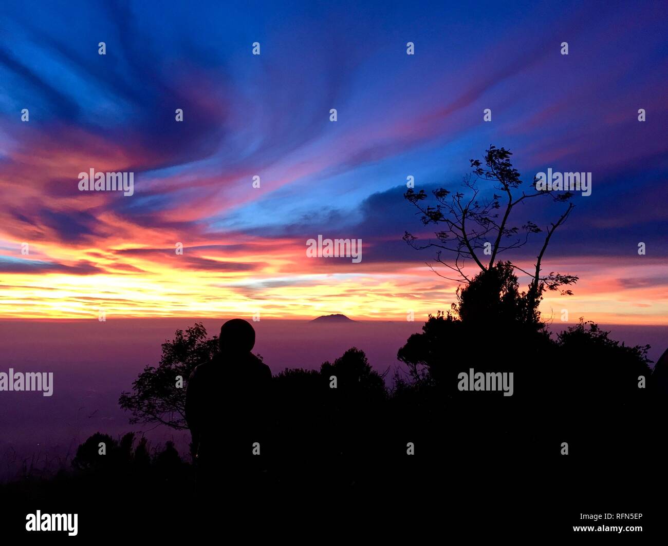 Double Summit Mount Merapi and Mount Merbabu experience Stock Photo - Alamy