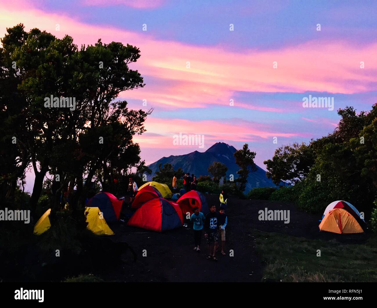 Double Summit Mount Merapi and Mount Merbabu experience Stock Photo - Alamy