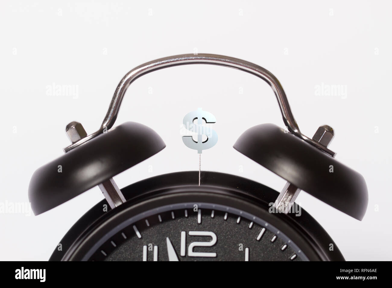 Alarm clock and dollars, time is money Stock Photo Alamy