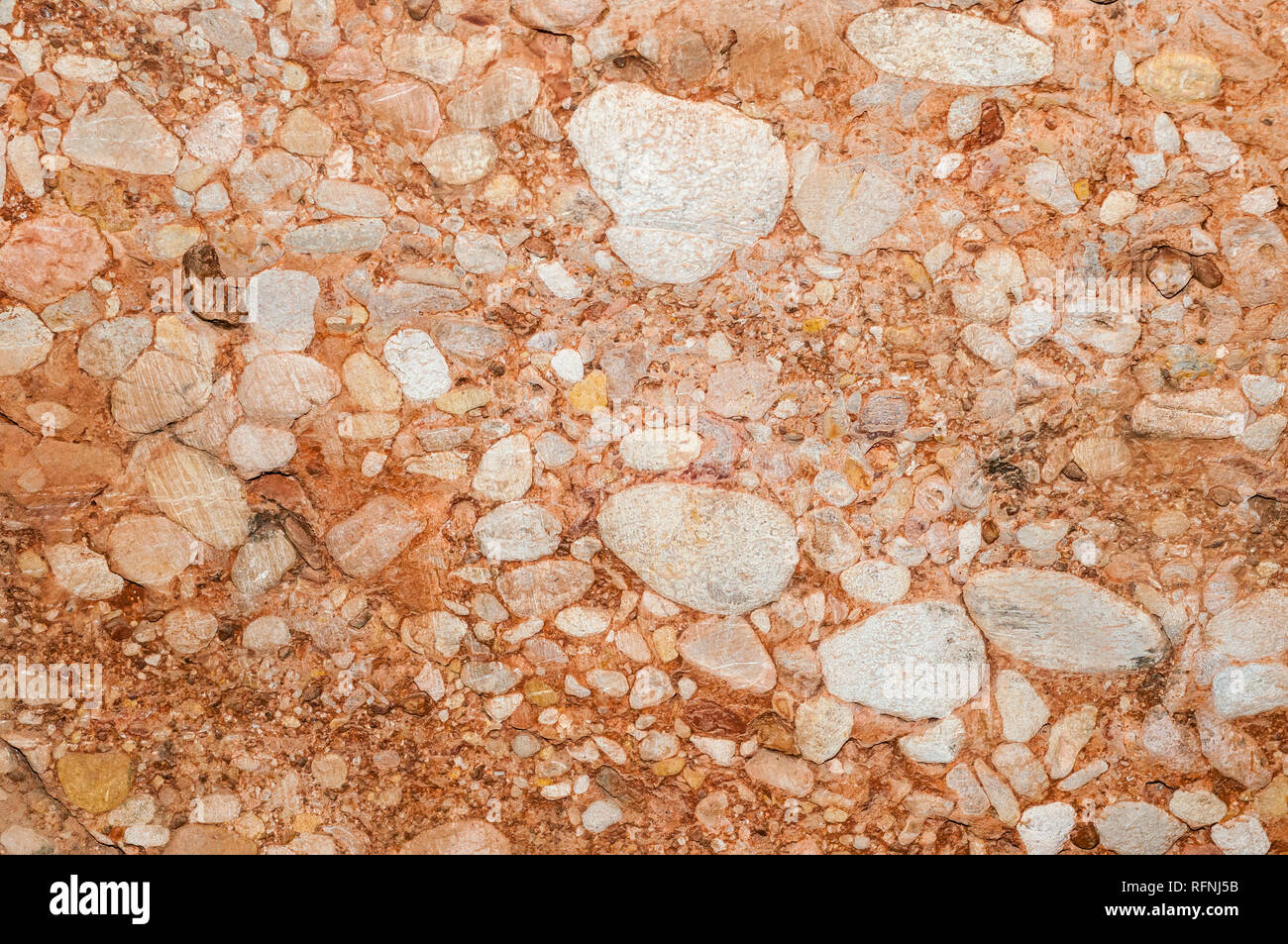 close-up view conglomerate rock inside salnitre caves in Montserrat, Collbató, Catalonia, Spain Stock Photo