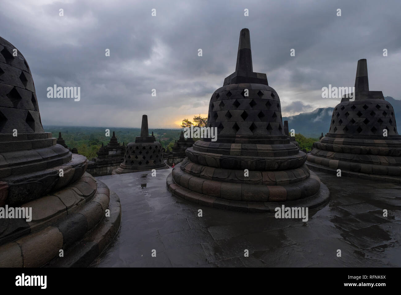 It's a rainy sunrise over Borobudur temple in Java, Indonesia. Stock Photo