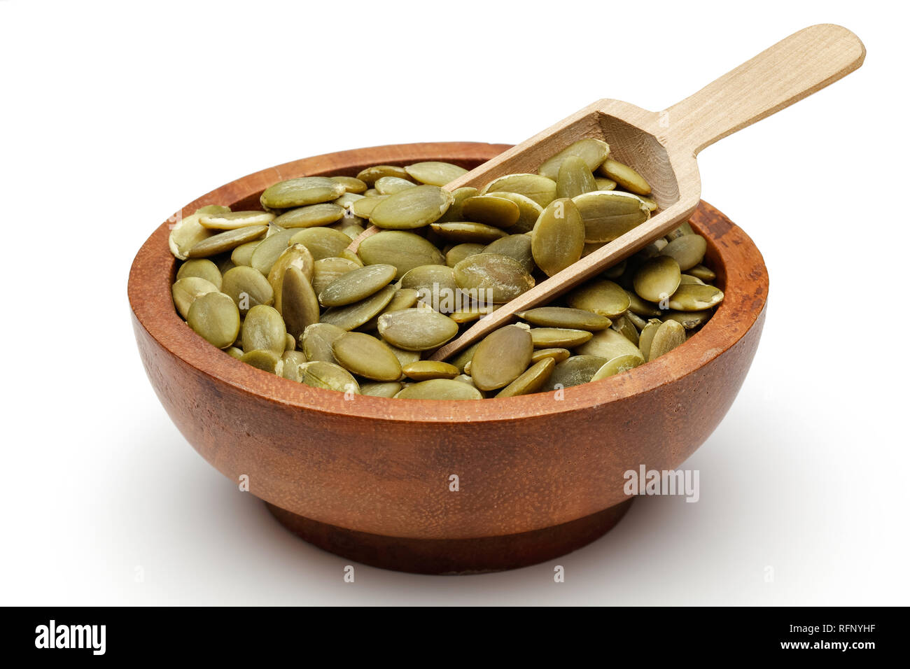 Download Peeled Pumpkin Seeds In Wooden Bowl And Spoon Isolated On White Background Stock Photo Alamy PSD Mockup Templates