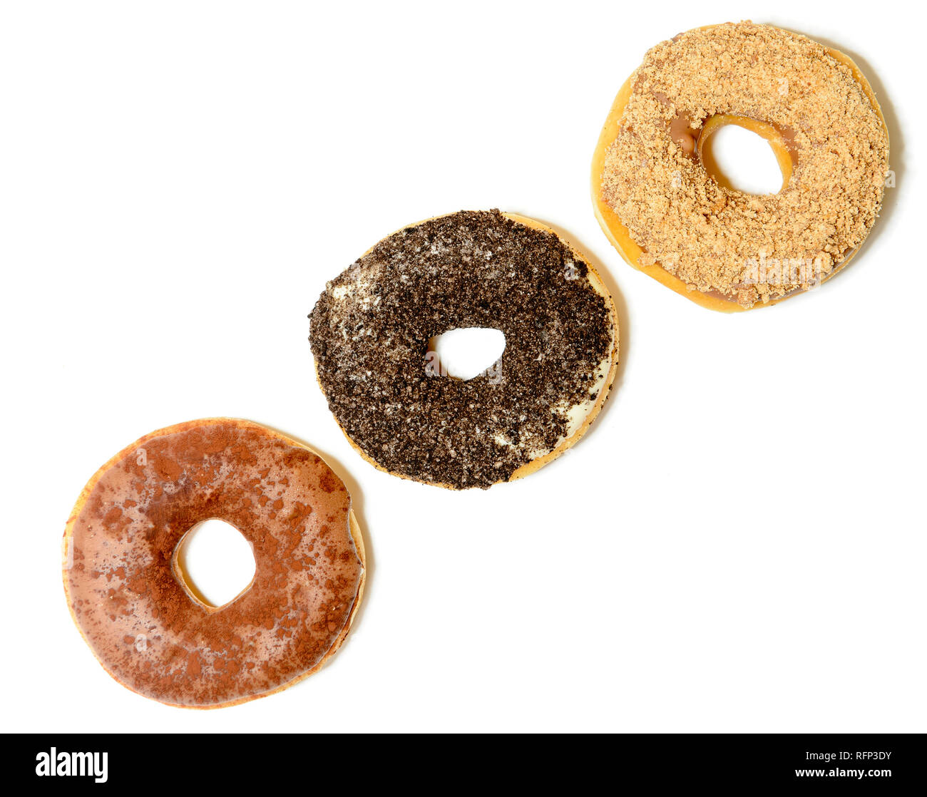 three donuts with sprinkles, isolated on white background Stock Photo