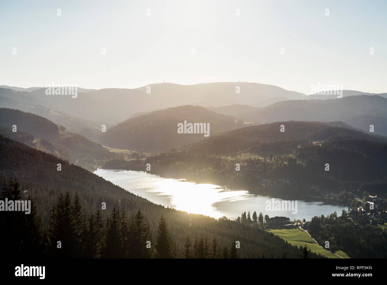 View from Hochfirst to Lake Titisee and Feldberg mountain at sunset, near Neustadt, Black Forest, Baden-Württemberg, Germany Stock Photo