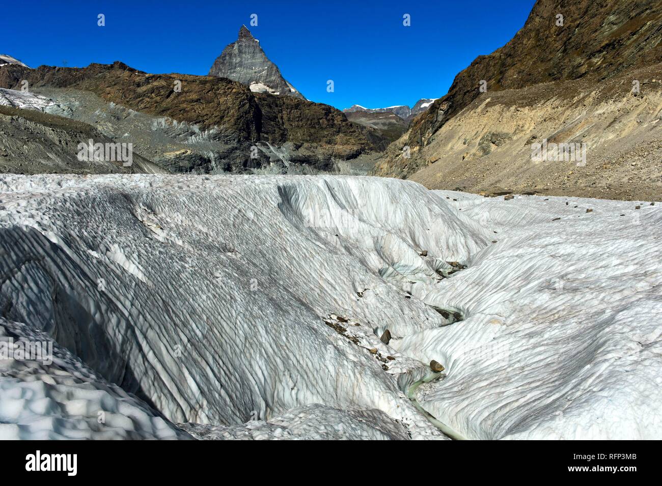 Wide crevasse on the Gorner Glacier, Matterhorn behind, Zermatt, Wallis, Switzerland Stock Photo