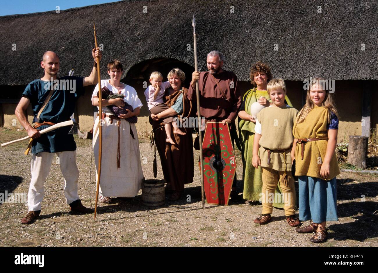 Family, outdoor museum 'Hjemsted Oldtidspark', a village of the Iron Age, Skaerbaek, Danmark Stock Photo