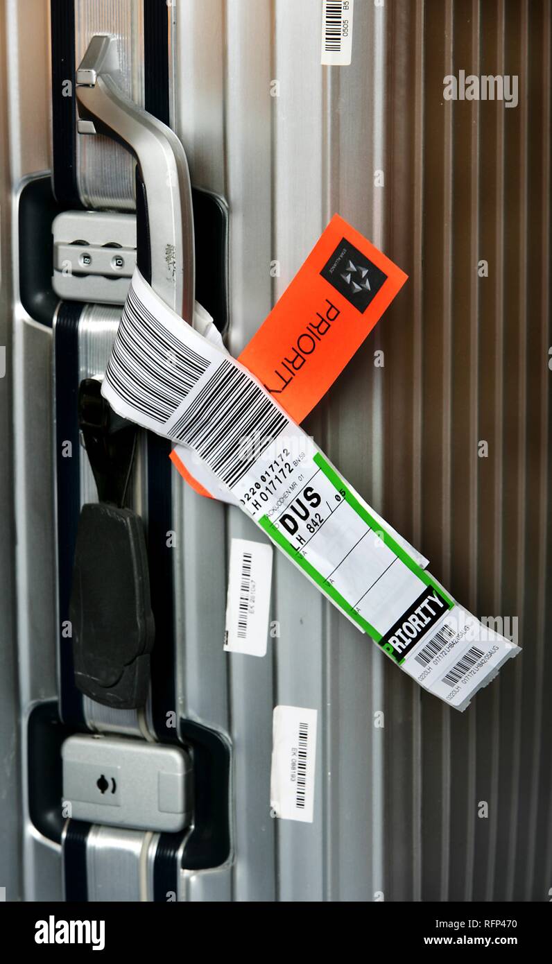 Priority label at a suitcase for Business Class passengers Stock Photo Alamy