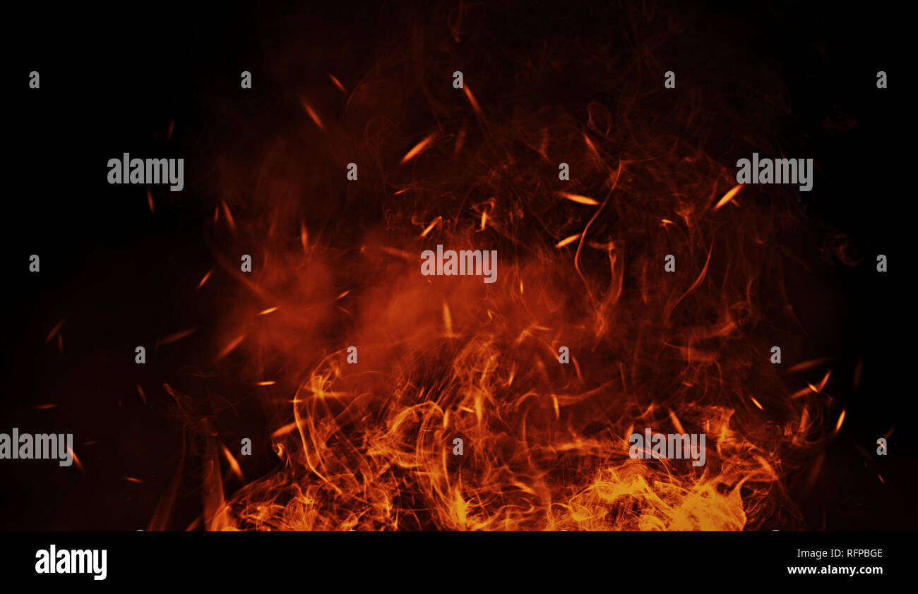 Vintage abstract flames with fire particles embers on isolated background. Stock Photo