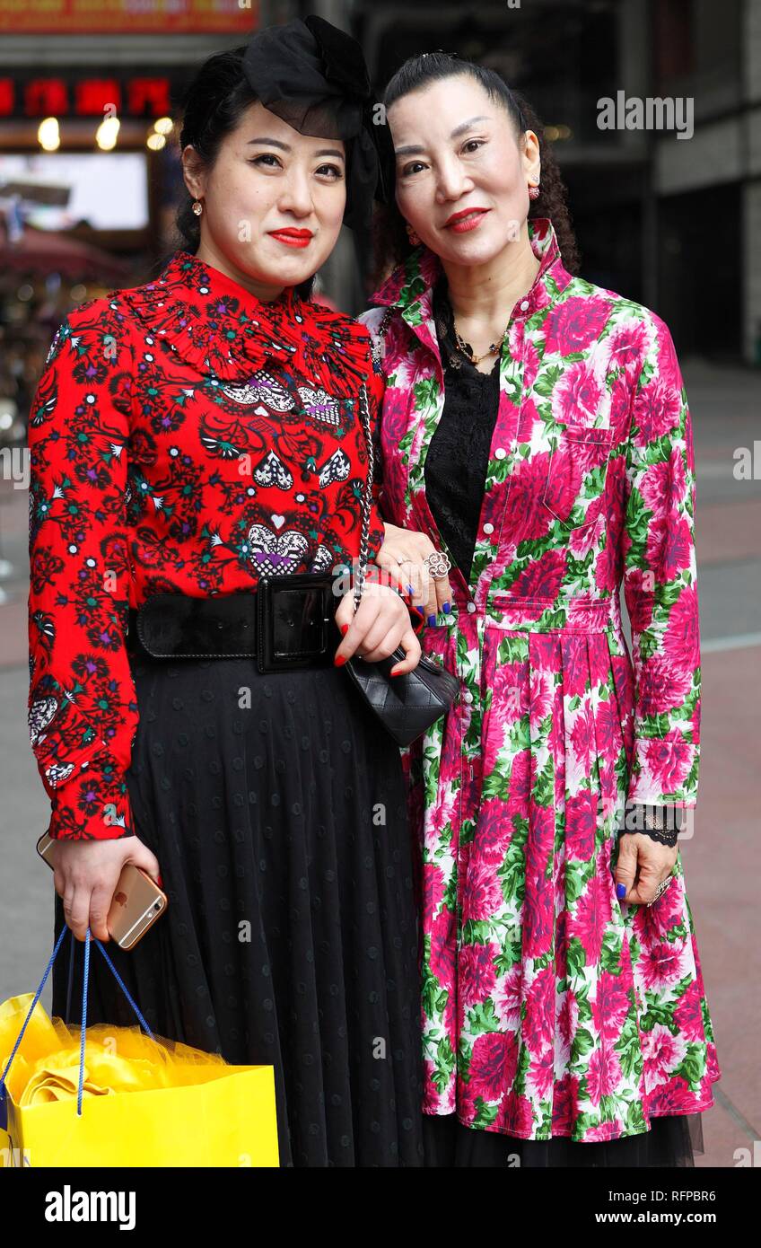 Chicly dressed women shopping at Jie Fang Bei, Chongqing, Chongqing Province, China Stock Photo