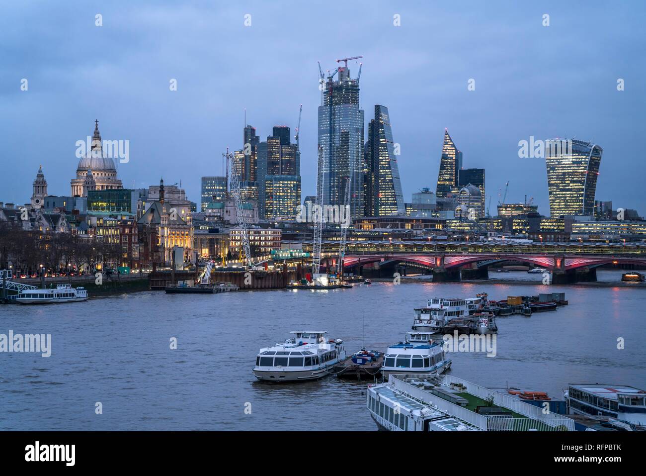 Skyline with Thames at dusk, London, Great Britain Stock Photo